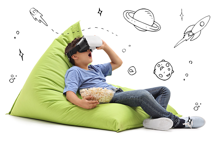 Boy on beanbag wearing VR helmet